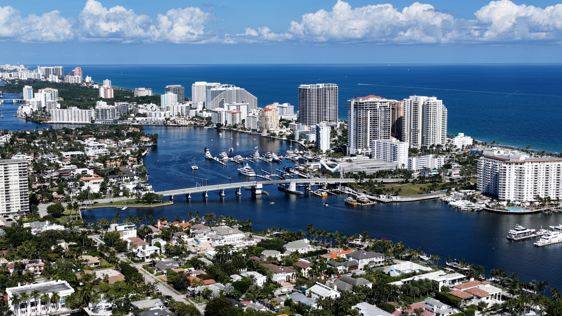Aerial view of Fort Lauderdale waterfront with yachts, Intracoastal Waterway, and Atlantic Ocean