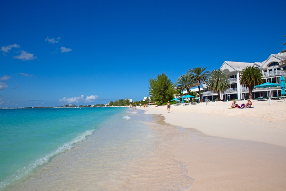 Turquoise waters and white sand beach along Seven Mile Beach in Grand Cayman