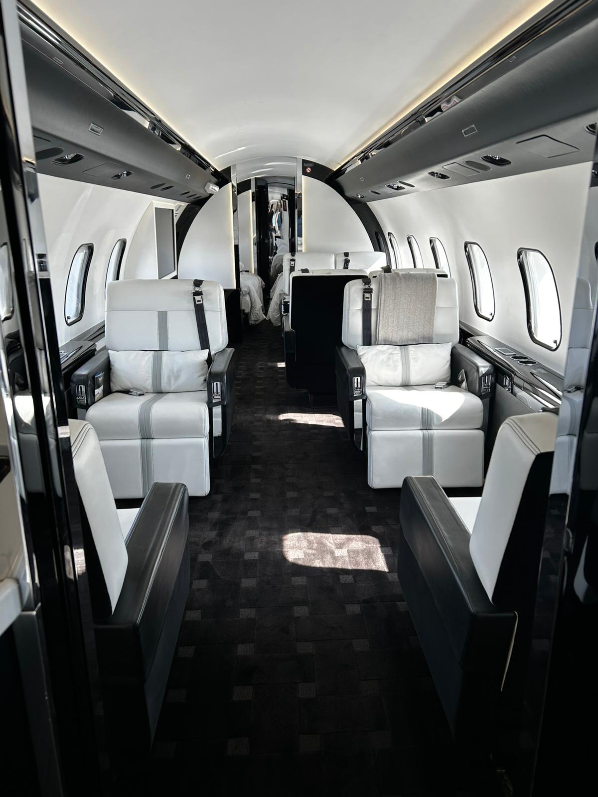 Luxury private jet interior cabin — how to book a charter flight with Haute Jets
